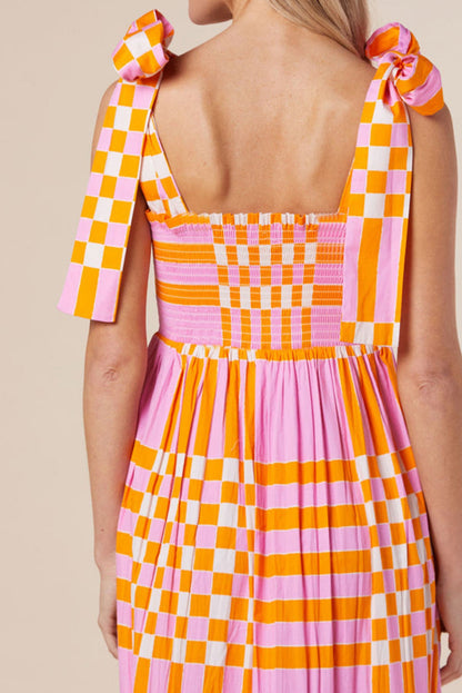 Girls color block tie shoulder dress with pink orange checker print and smocked bodice on Tampa Home & Garden Store