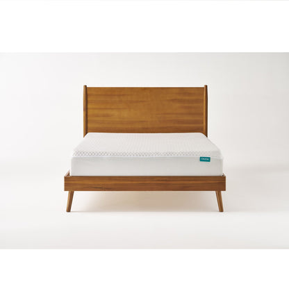Mid-century wooden platform bed in light brown with white mattress and teal OkiOkI tag on Tampa Home & Garden Store