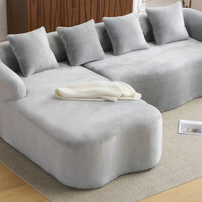 Modular L-shape sectional sofa with curved chaise in light gray plush fabric on Tampa Home & Garden Store