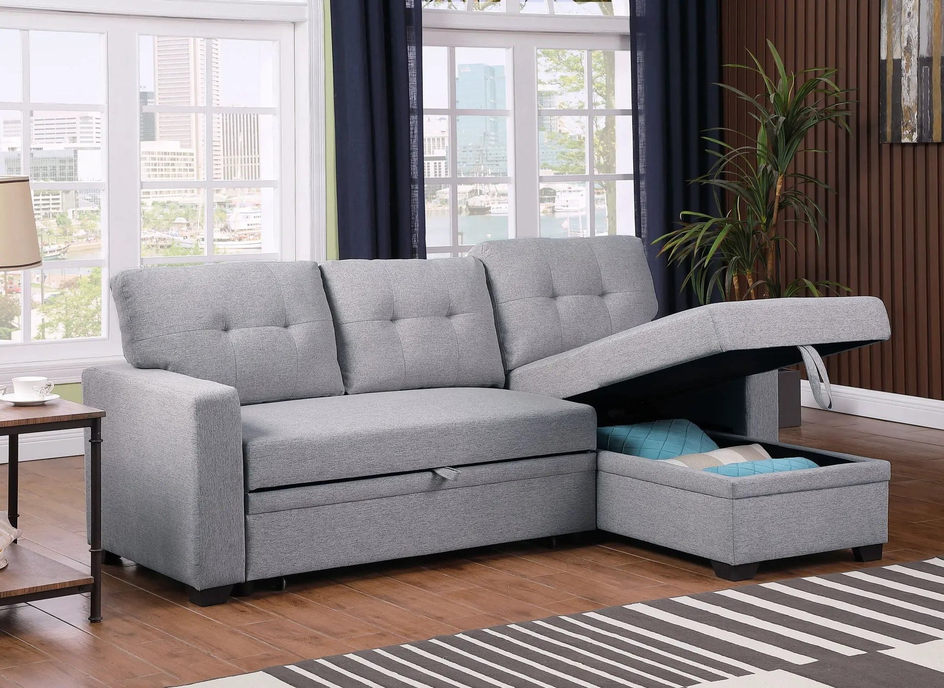Upholstered pull-out sectional sofa with chaise in light gray fabric by Unique Piece Furniture on Tampa Home & Garden Store