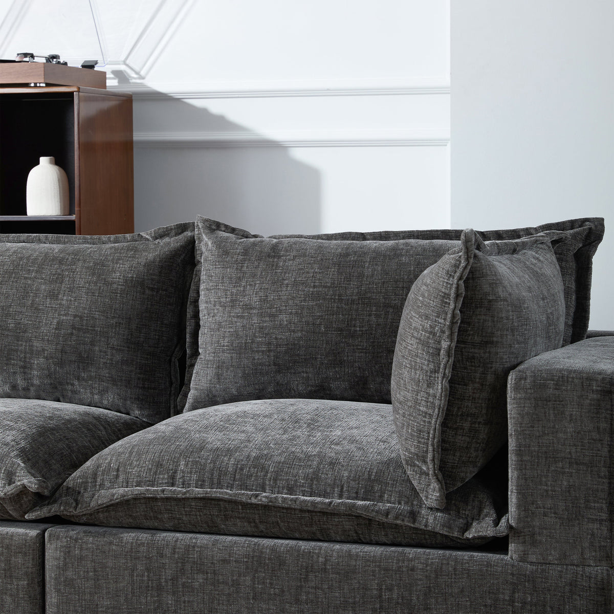 Modular sectional sofa with movable storage ottoman in charcoal gray fabric on Tampa Home & Garden Store