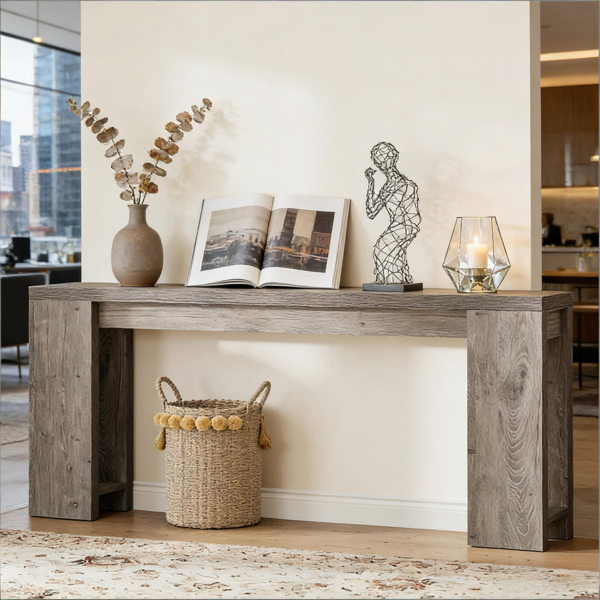 Wood entryway console table in weathered gray finish with legs, vase, book, lamp on Tampa Home & Garden Store