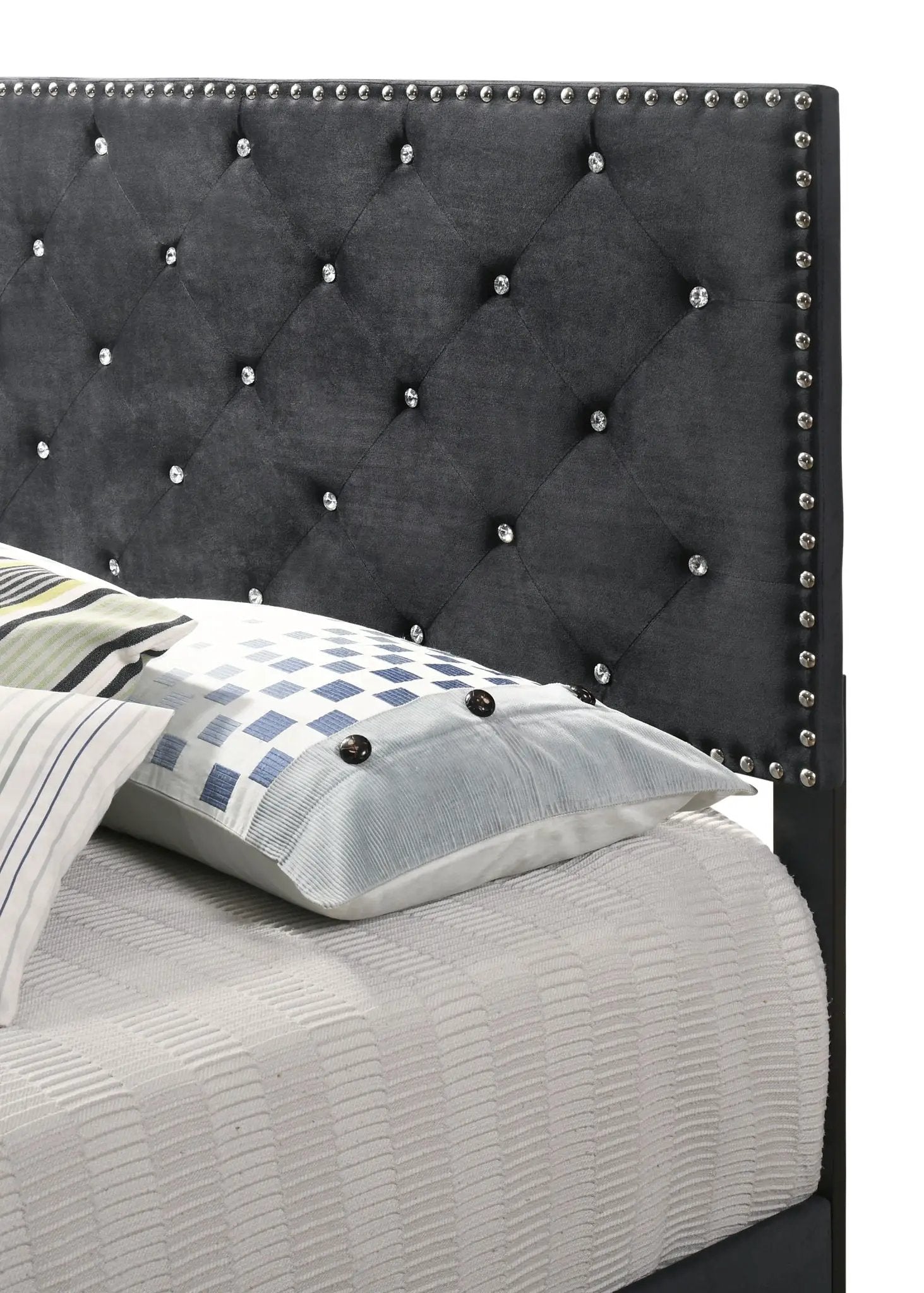 Luxurious upholstered bed in dark charcoal fabric with diamond tufting and crystal studs on Tampa Home & Garden Store