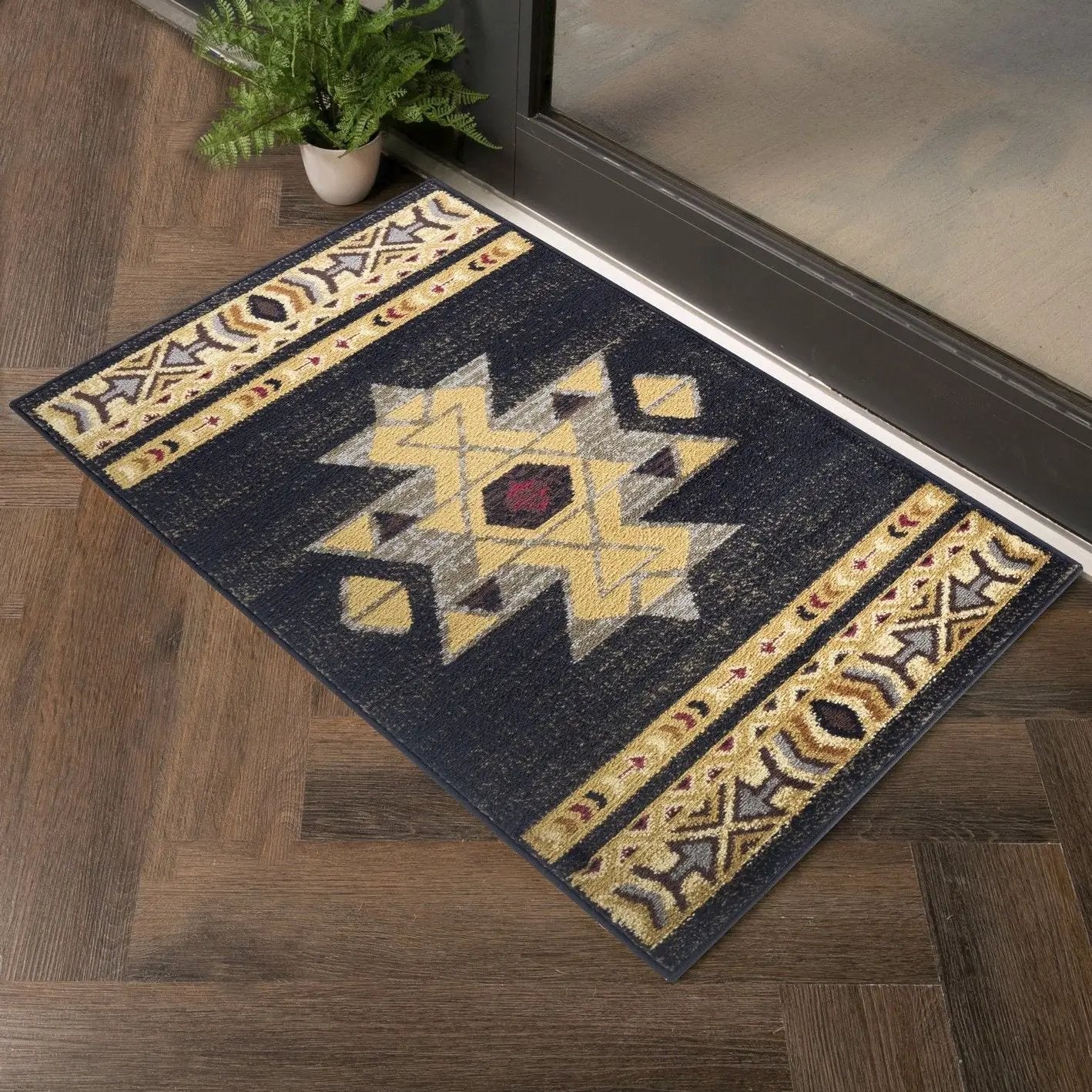 Area rug Tribes GC_YLS4004 Southwest with geometric star motif on dark navy field beige border on Tampa Home & Garden Store
