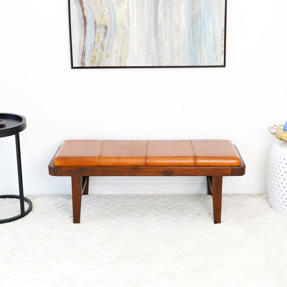 Rustic upholstered bench with tan leather cushion and dark wood legs by HouseOfZazla on Tampa Home & Garden Store