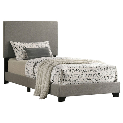 Efram Panel Bed upholstered gray platform bed by HouseOfZazla with lettered bedding on Tampa Home & Garden Store