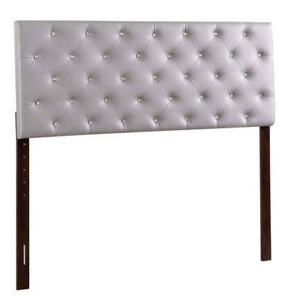 Upholstered headboard with diamond tufting in gray faux leather and crystal buttons; wooden legs on Tampa Home & Garden Store