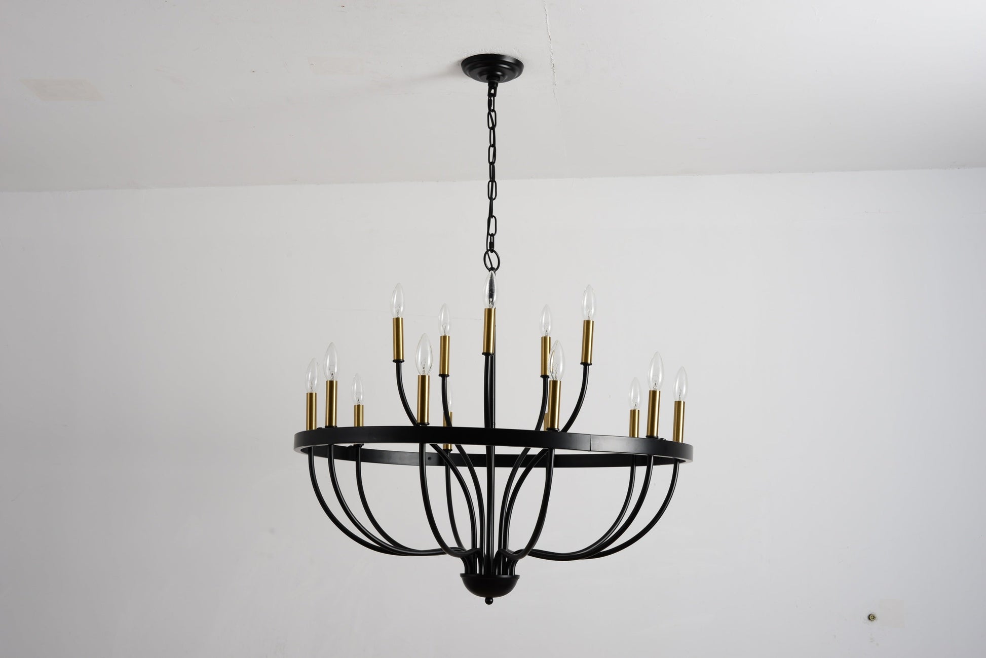 18-Light industrial iron chandelier in black with gold candle sleeves on Tampa Home & Garden Store