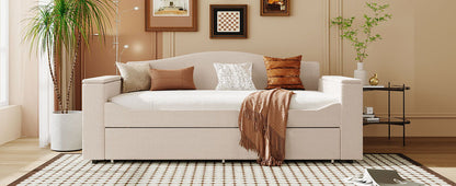 Upholstered beige daybed with storage drawers and a neutral throw, living room setup on Tampa Home & Garden Store