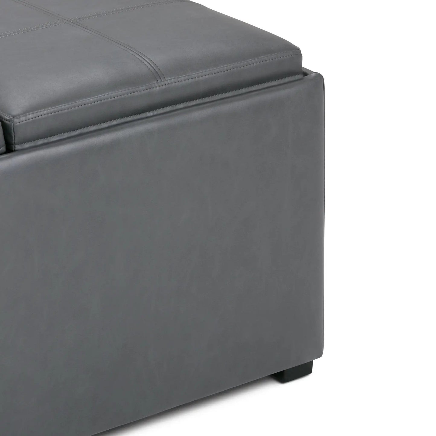 Avalon square coffee table storage ottoman in gray faux leather with visible stitching on Tampa Home & Garden Store