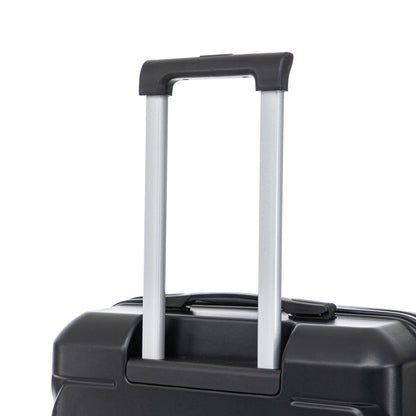 Spinner luggage with silver telescoping handles and black exterior on Tampa Home & Garden Store