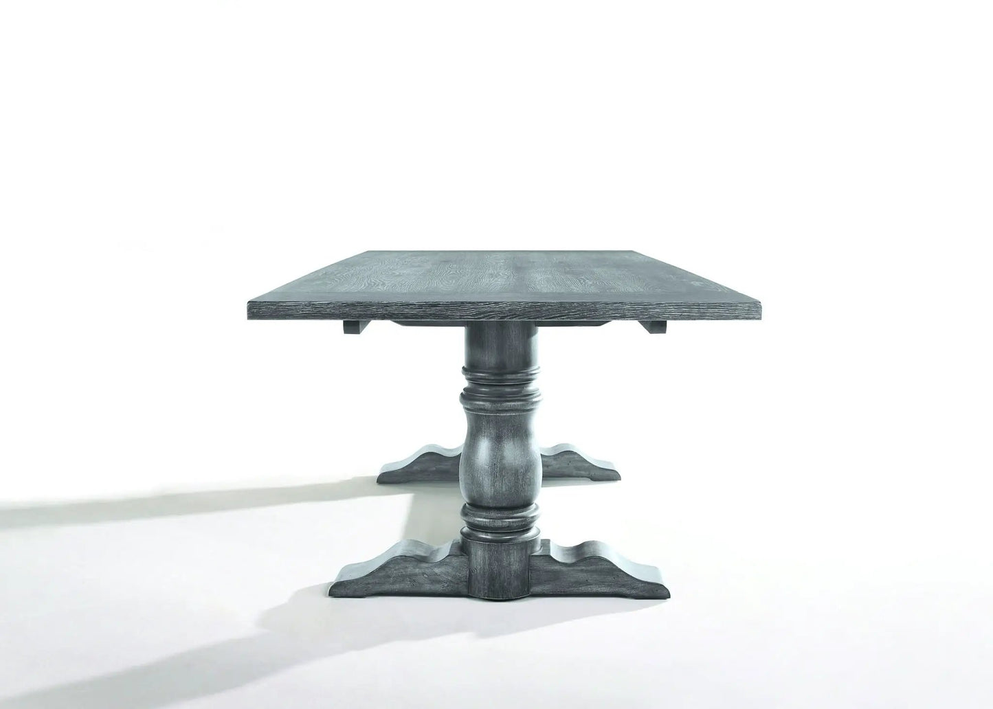 Leventis dining table in weathered gray wood with a carved pedestal base by Unique Piece Furniture on Tampa Home & Garden Store