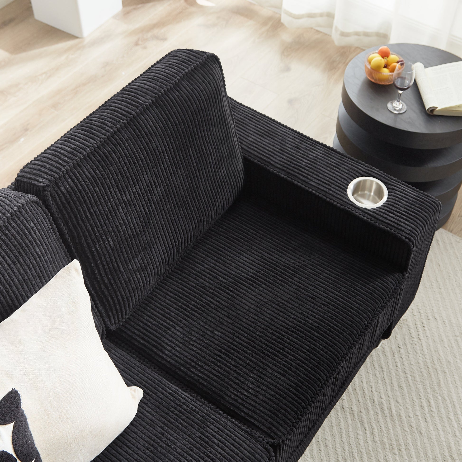 Modern Corduroy 3-Seater Sofa by HouseOfZazla in black ribbed corduroy, with round coffee table on Tampa Home & Garden Store
