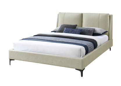 Fully upholstered beige platform bed with padded headboard and black legs on Tampa Home & Garden Store