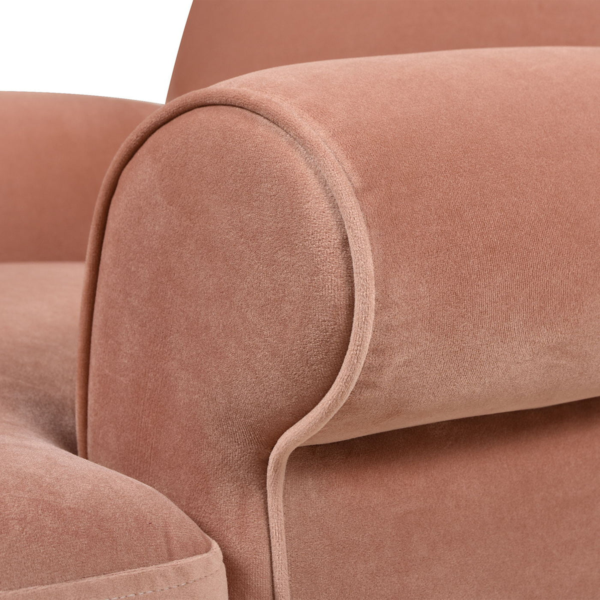 Accent arm chair in dusty rose velvet with a rolled arm and piping detail on Tampa Home & Garden Store