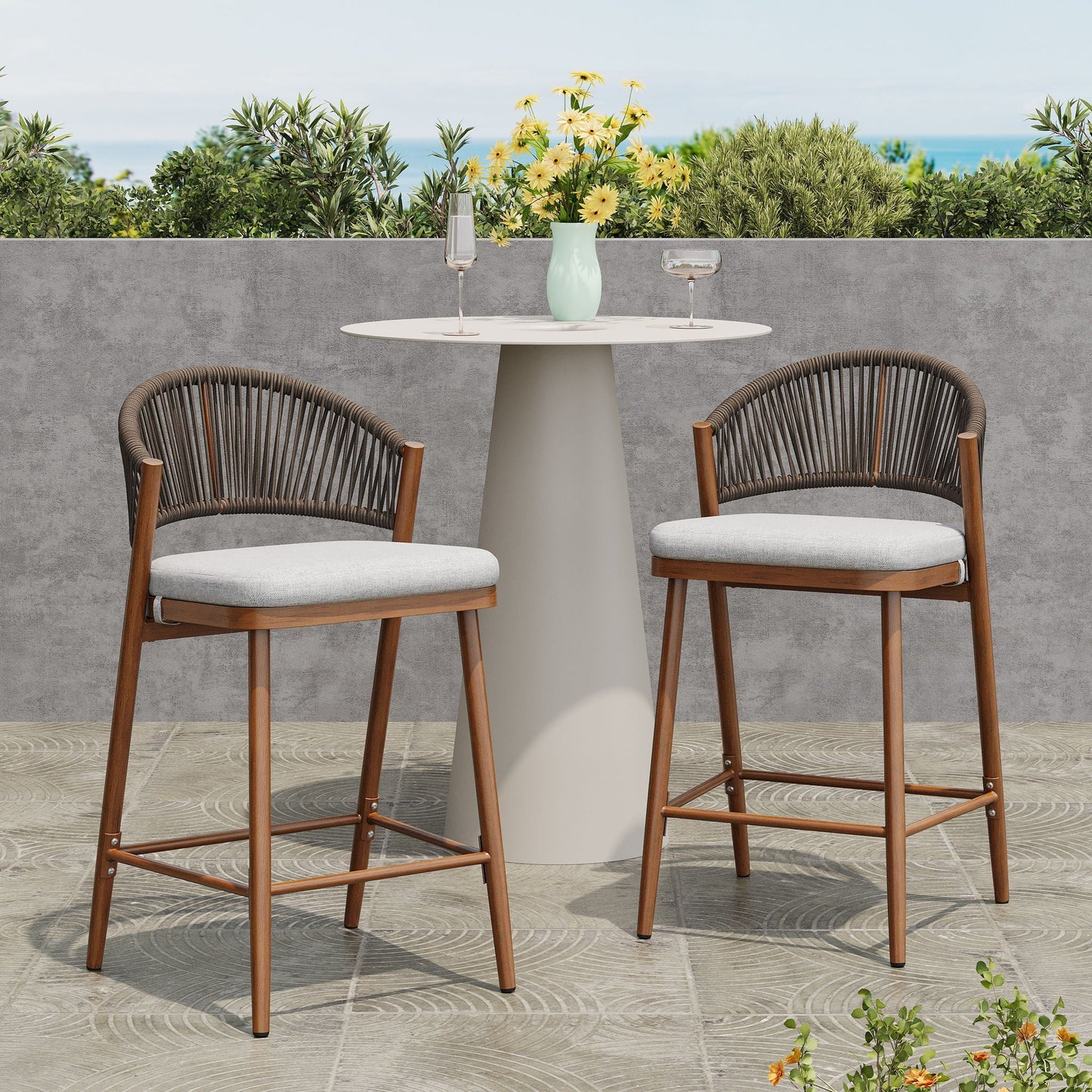 Outdoor 26in metal-frame stools with scallop-back and water-resistant cushions, two at a table on Tampa Home & Garden Store