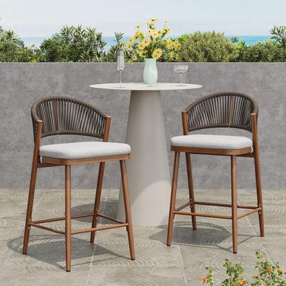 Outdoor 26in metal-frame stools with scallop-back and water-resistant cushions, two at a table on Tampa Home & Garden Store