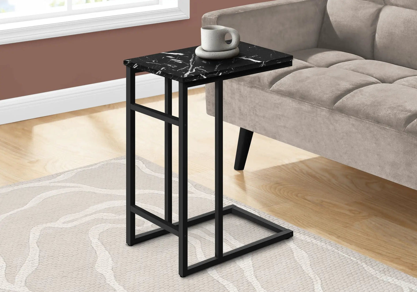 Accent table C-shaped with black marble top and black metal frame, modern design on Tampa Home & Garden Store