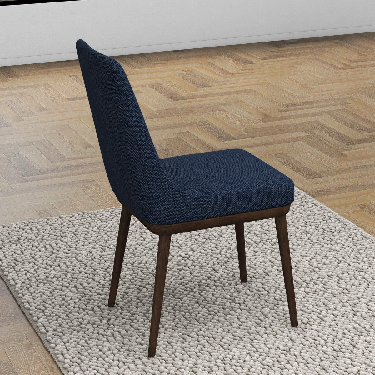 Dining chair in dark blue with mid-century modern style and solid wood legs on Tampa Home & Garden Store