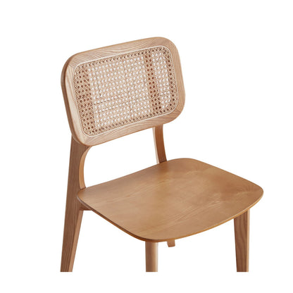 Dining chair by HouseOfZazla with cane backrest and light brown wood frame on Tampa Home & Garden Store
