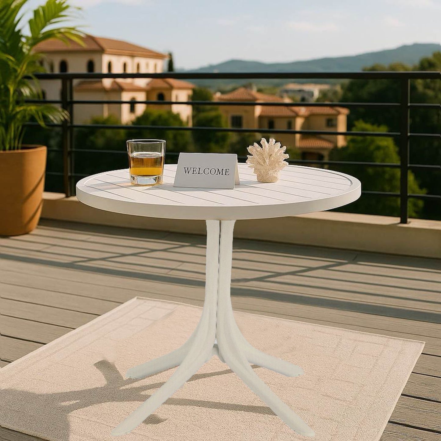 Modern Round Table white waterproof UV resistant with pedestal base on a balcony deck on Tampa Home & Garden Store