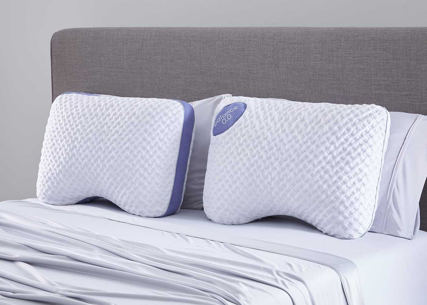 BedGear Balance Cuddle Curve Pillow air-mesh, white quilted with purple trim, 2-pack on bed on Tampa Home & Garden Store
