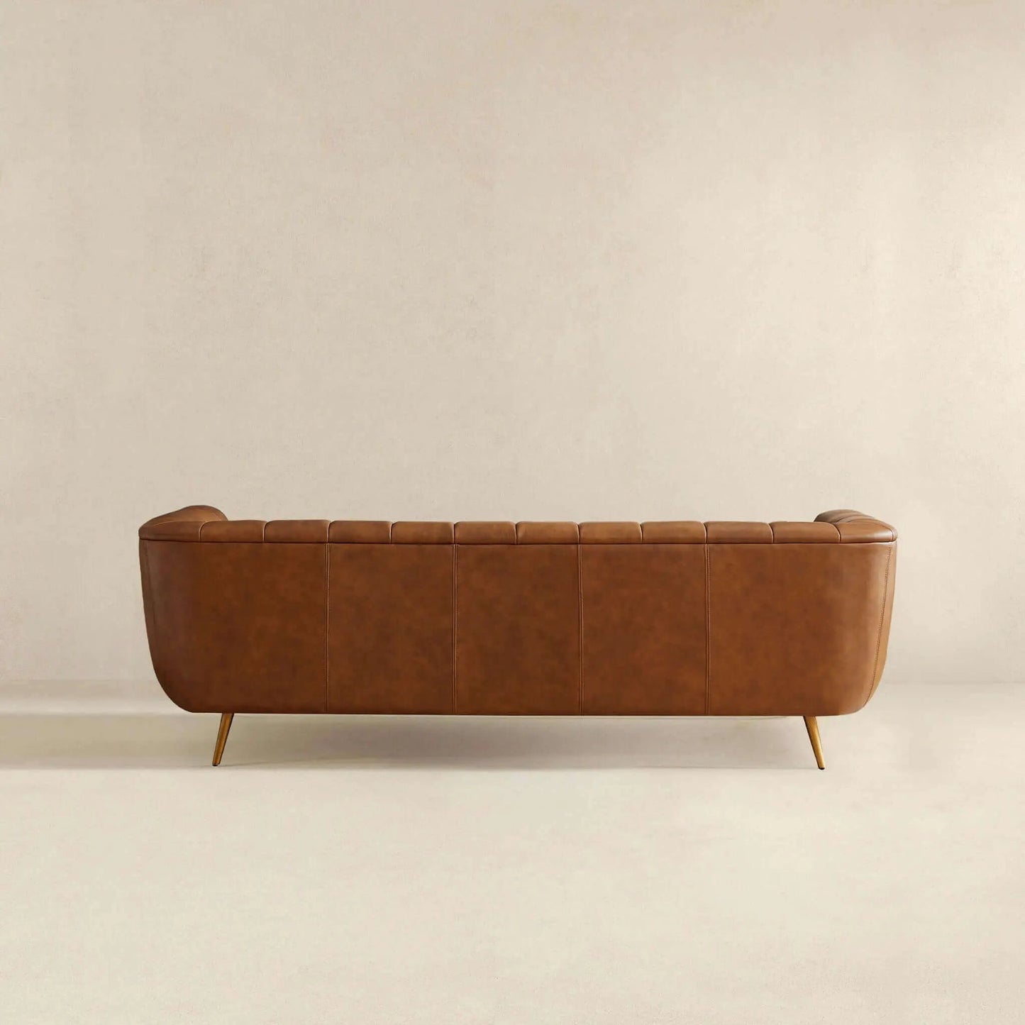 Ava Sofa Gold / Tan leather stationary sofa by Unique Piece Furniture with tufted back on Tampa Home & Garden Store