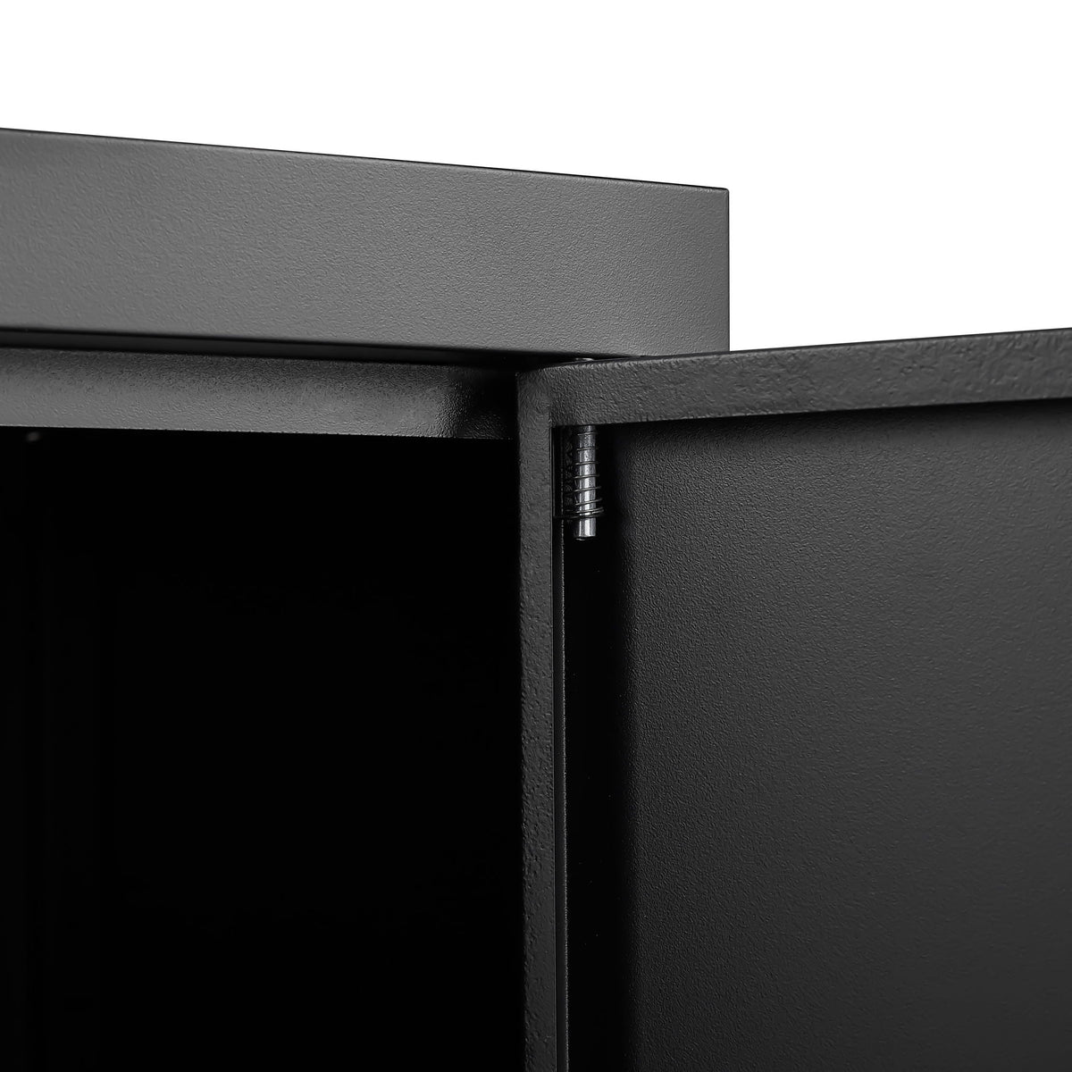 Metal storage cabinet corner with dark gray textured steel surface and visible hinge on Tampa Home & Garden Store
