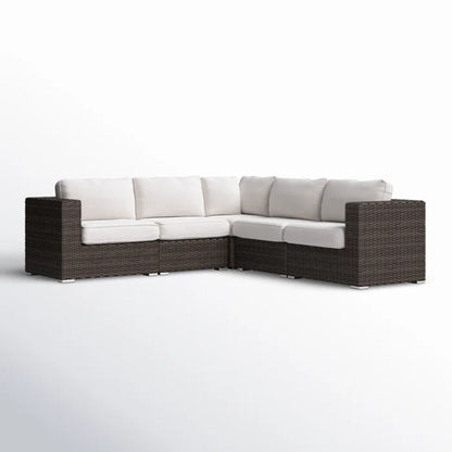 Luxurious wicker patio sectional with white Sunbrella cushions, L-shaped HouseOfZazla on Tampa Home & Garden Store