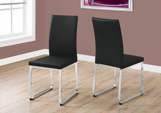Dining side chairs upholstered in black faux leather with chrome cantilever legs, set of 2 by Unique Piece Furniture on Tampa Home & Garden Store