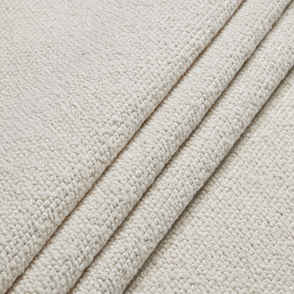 Hosford upholstered bed fabric close-up in beige boucle texture on Tampa Home & Garden Store