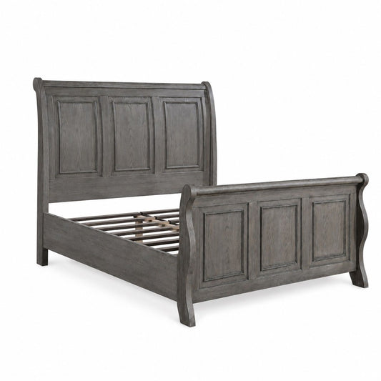 Gray panel bed frame with tall headboard and curved footboard, part of a 3-piece bedroom set on Tampa Home & Garden Store