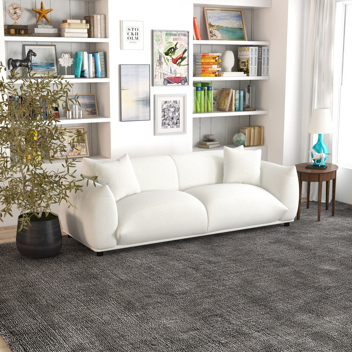 Mid-Century Modern Luxury Tufted Sofa in white upholstery by HouseOfZazla in bright living room on Tampa Home & Garden Store