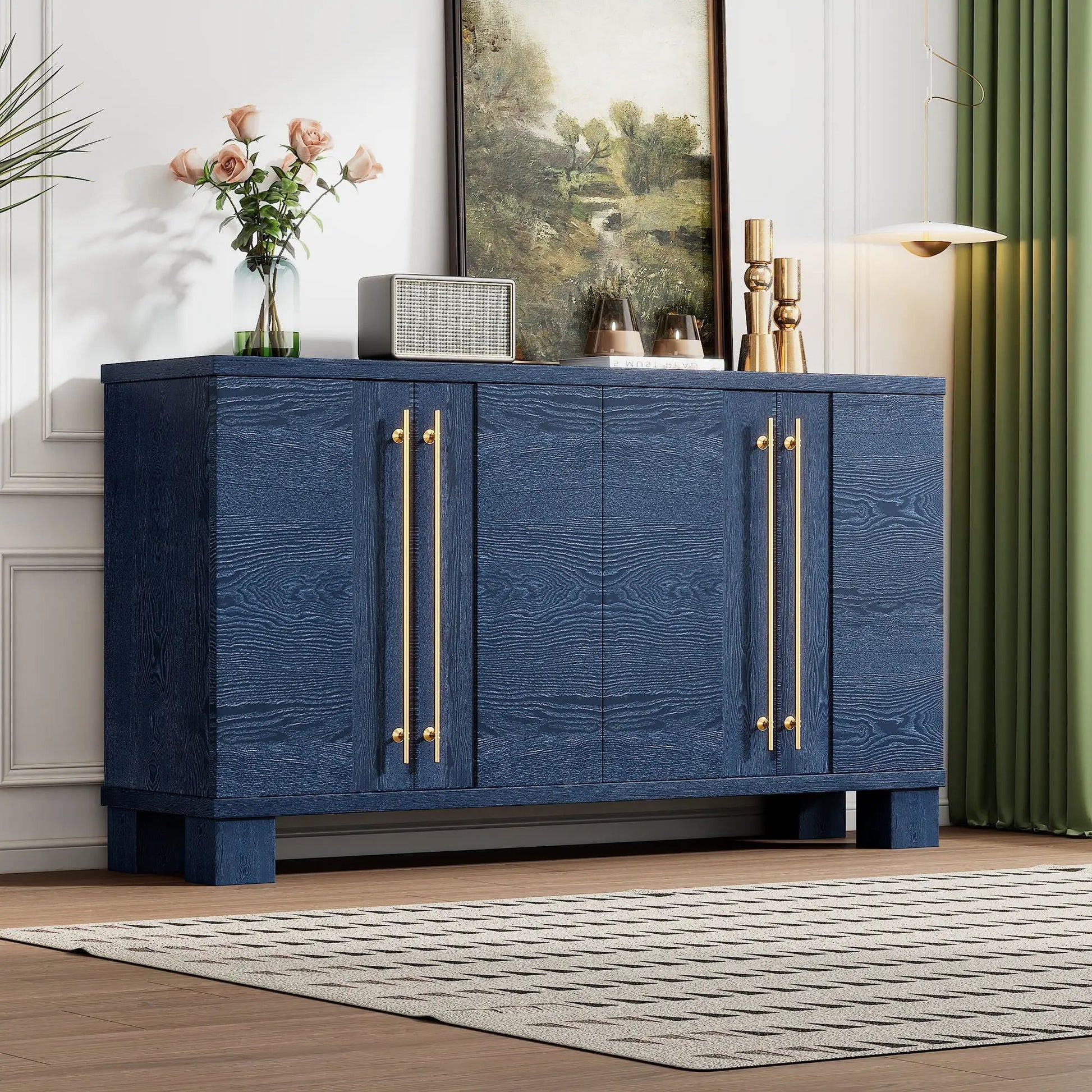 Sideboard With Adjustable Shelves by Unique Piece Furniture in navy blue with gold hardware, topped with pink roses and a landscape painting on Tampa Home & Garden Store