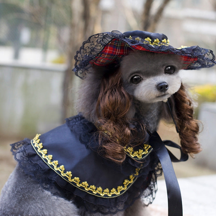 Christmas dog outfit by Pet Zen with navy lace cape, gold trim and plaid hat on Tampa Home & Garden Store