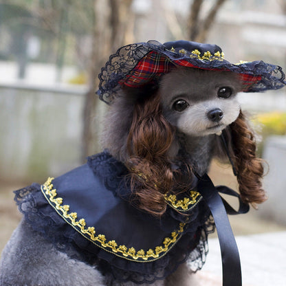 Christmas dog outfit by Pet Zen with navy lace cape, gold trim and plaid hat on Tampa Home & Garden Store