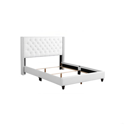 Upholstered nailhead bed with white tufted headboard and studded border by HouseOfZazla on Tampa Home & Garden Store