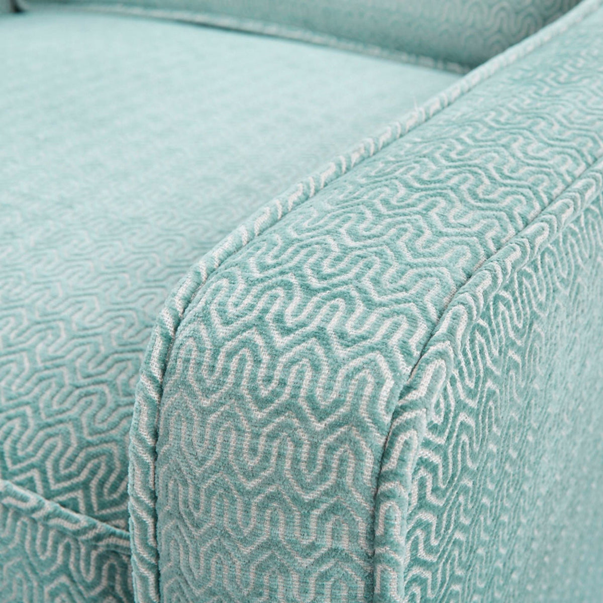 Swivel chair upholstery close-up in light blue with a raised wave stitch pattern HouseOfZazla on Tampa Home & Garden Store