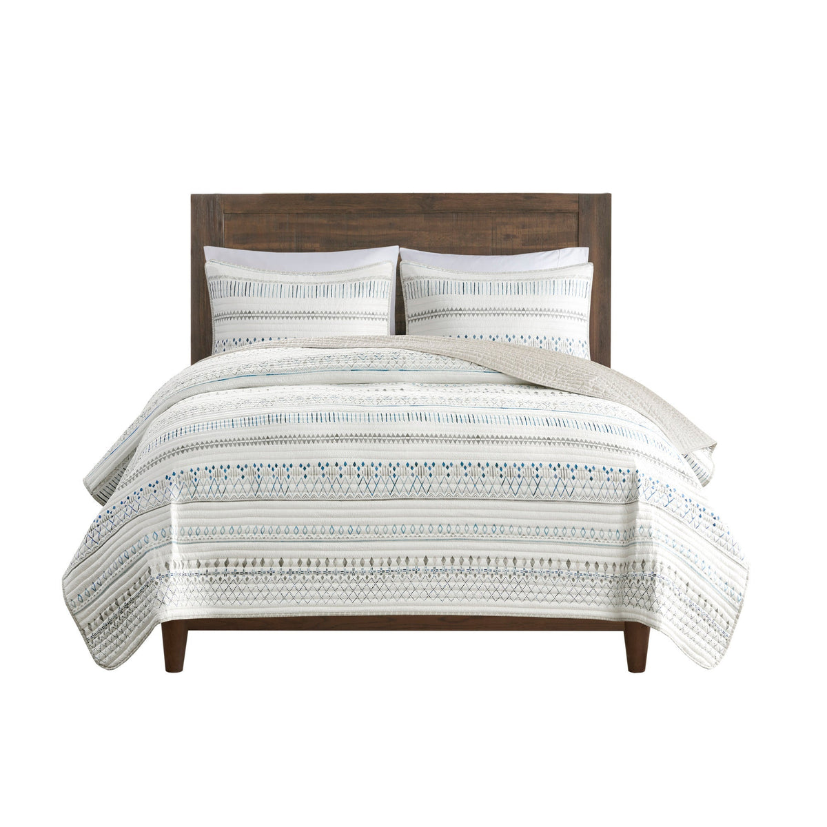Printed microfiber seersucker quilt set taupe/blue with reversible design on bed by HouseOfZazla on Tampa Home & Garden Store