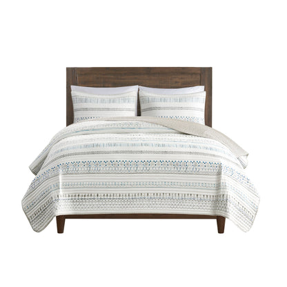 Printed microfiber seersucker quilt set taupe/blue with reversible design on bed by HouseOfZazla on Tampa Home & Garden Store