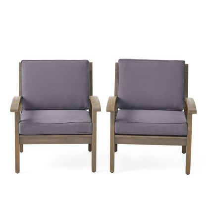 Two Peyton Club outdoor arm chairs in acacia wood by HouseOfZazla with dark gray cushions on Tampa Home & Garden Store