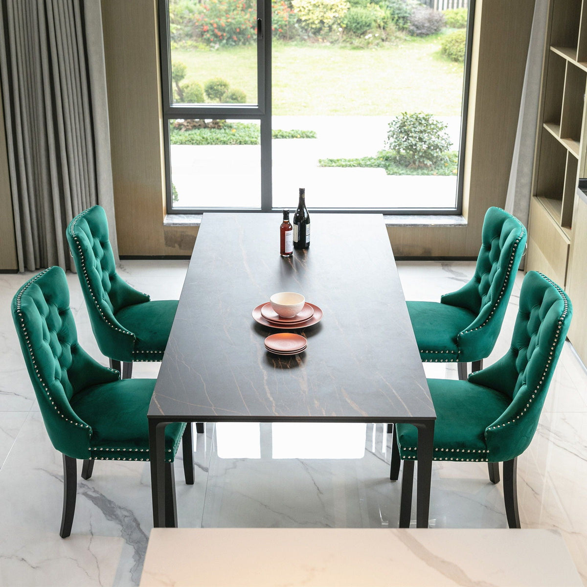 Tufted velvet dining chair set in teal with nailhead trim, 4 chairs around a dark table on Tampa Home & Garden Store