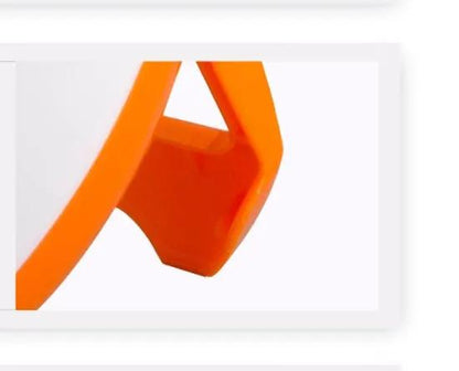 Baby pacifying sleep aid device with orange plastic housing and curved strap FLIPSTYLEZLLC on Tampa Home & Garden Store