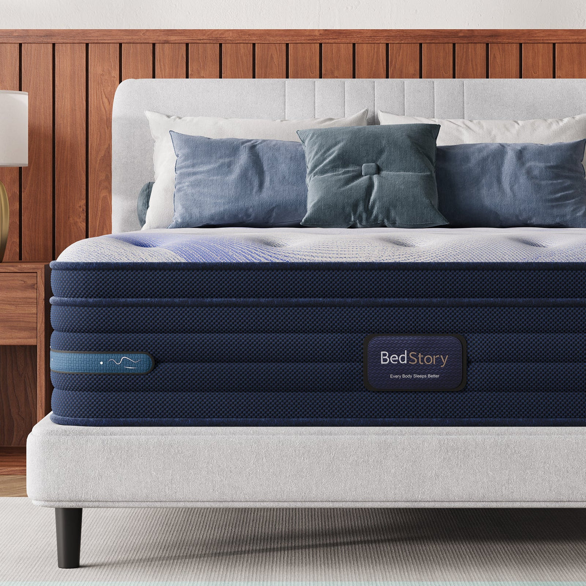 BedStory Spine Align 12-inch full firm cooling hybrid mattress with navy blue sides on gray bed on Tampa Home & Garden Store