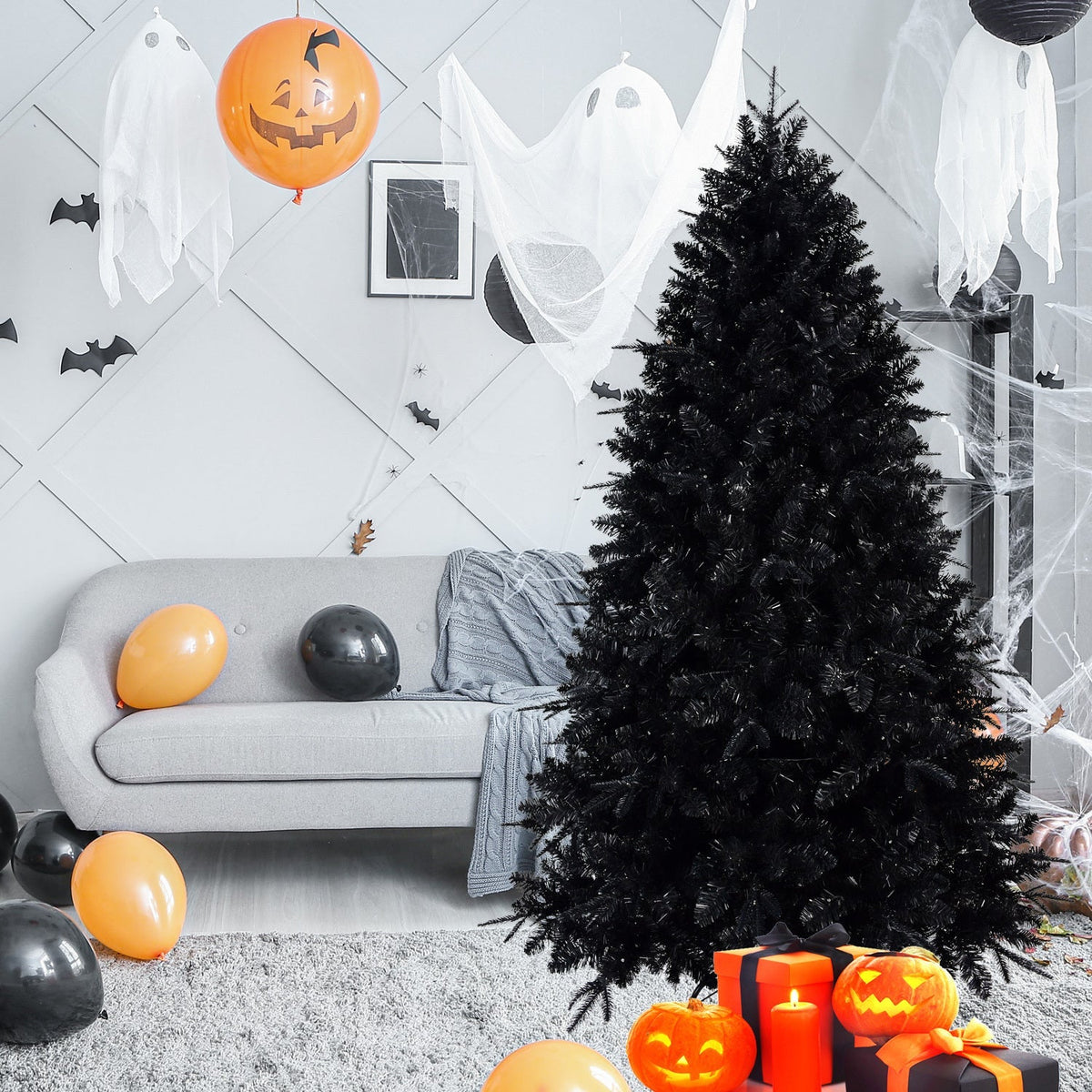 6-Foot pre-lit black Christmas tree with 350 LEDs in a Halloween living room with pumpkins on Tampa Home & Garden Store