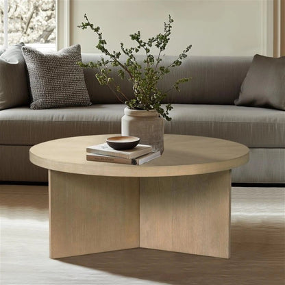 Round coffee table with solid veneer top in light wood by Unique Piece Furniture on Tampa Home & Garden Store