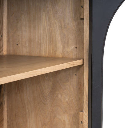 4-Door storage sideboard interior with natural wood shelves and black arched frame edge on Tampa Home & Garden Store