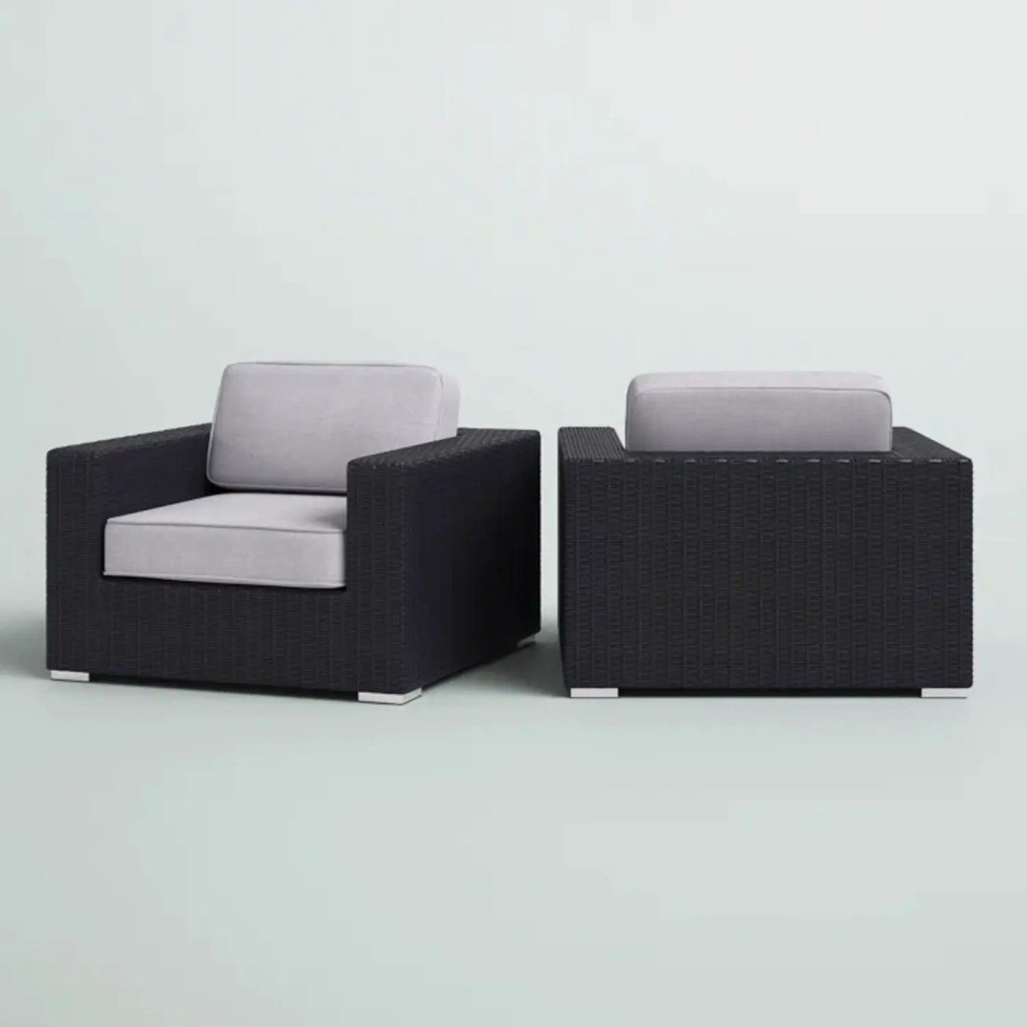 Pair of black wicker patio arm chairs with light gray cushions by Unique Piece Furniture on Tampa Home & Garden Store