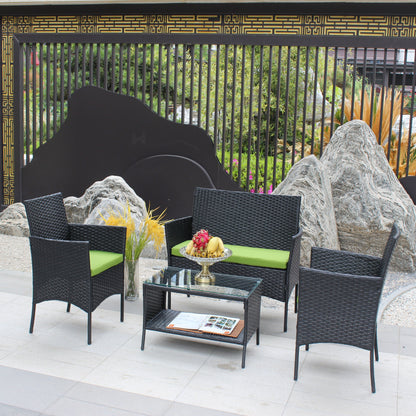 4 pc rattan outdoor furniture set with black wicker chairs and green cushions, glass coffee table on Tampa Home & Garden Store