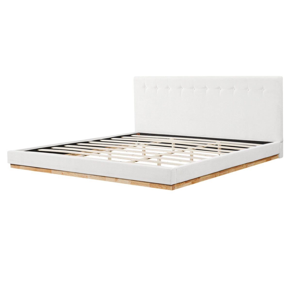 Solid rubber wood platform bed with white upholstered headboard and slatted base on legs on Tampa Home & Garden Store